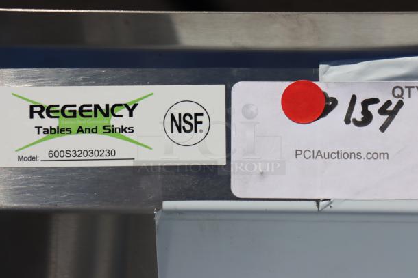 Regency 600S32030230 stainless steel sink label with NSF certification and auction details, minor condition notes.