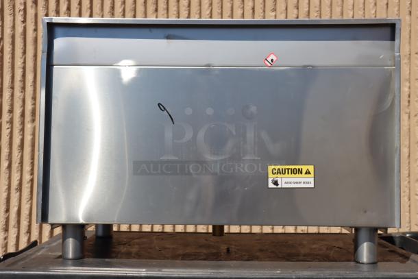 Regency 600IB1830 18"x30" underbar ice bin, 98 lb capacity, new, with bent backsplash, missing back base leg connector.