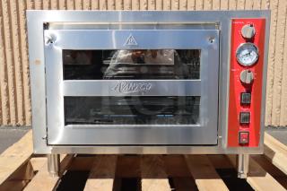 BRAND NEW! Avantco DPO-18-DS Double Deck Countertop Pizza/Bakery Oven - 3200W, 240V. S/N: DPO18DSD24120031. Unit is out of original packaging, missing door handles & cordierite stones. - Item #1203565