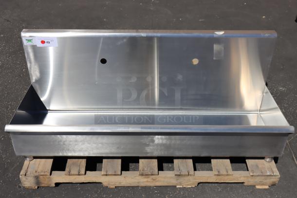 Regency 600HSMSB1848 wall-mounted 48"x17.5" hand sink, brand new, includes wall brackets and drain, minor scratches/dents.