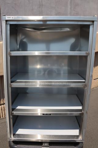 Brand new Regency 600CT5S1624E utility cart with five 16"x24" stainless steel shelves. Enclosed base, open front. Scratch-n-dent model.