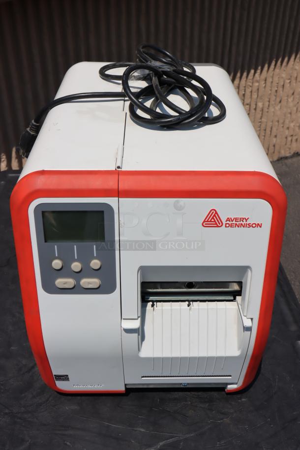 Brand new Avery-Dennison ADTP1BA01NA barcode label printer. Serial number: 17060729. Featured LCD and control buttons.