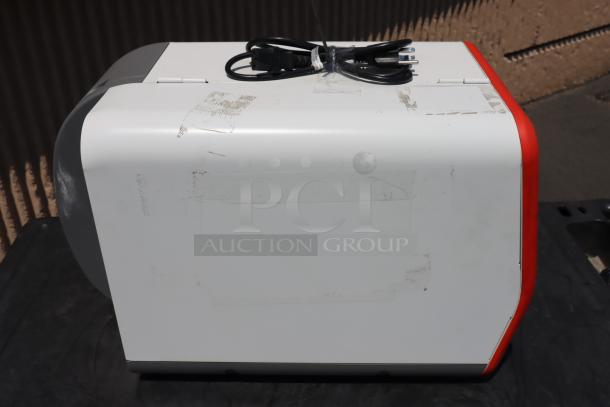 BRAND NEW Avery-Dennison ADTP1BA01NA tabletop barcode label printer with attached power cord, model ADTP1, S/N: 16030959.