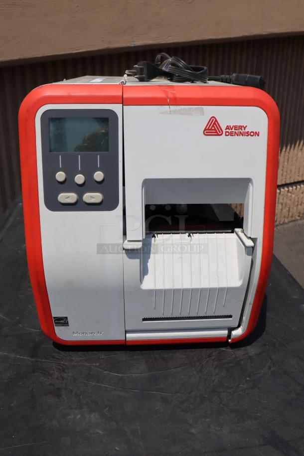 Brand new Avery-Dennison ADTP1BA01NA tabletop barcode label printer, model ADTP1, S/N 19085204, with display and controls.