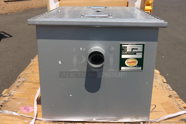 Brand new Regency 600GT15 30 lb. grease trap, 15 GPM, with 2" non-threaded connections, in excellent condition.