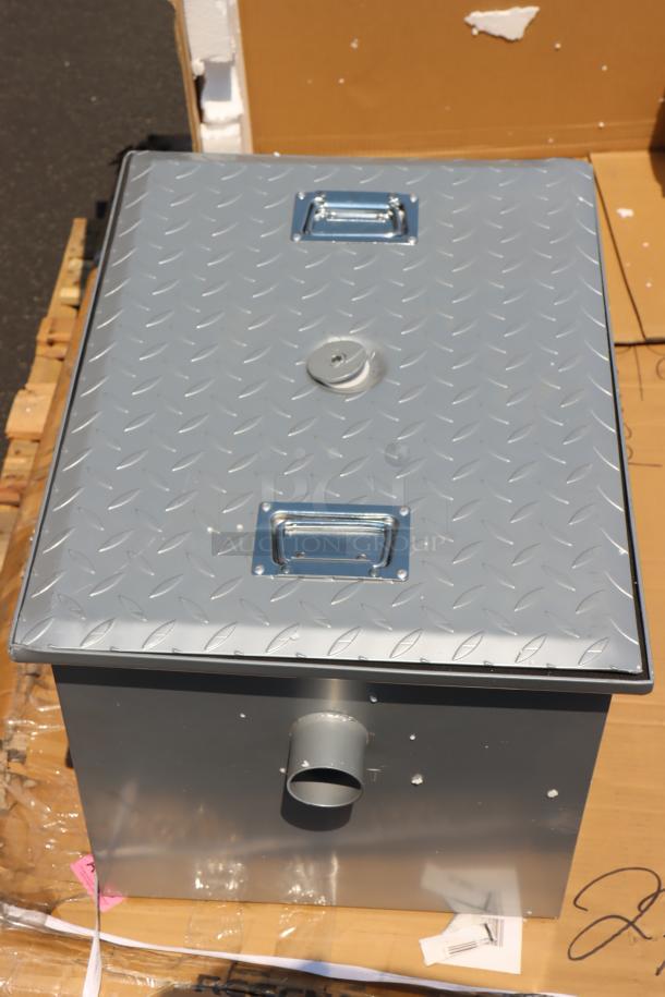 Brand new Regency 600GT15 grease trap, 30 lb., 15 GPM, with 2" non-threaded connections, out of packaging.