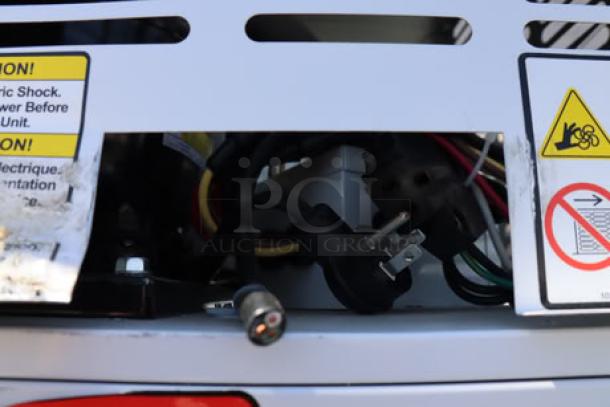 Leer 60AS-R290 ice merchandiser interior showing wiring and labels. Unit has missing power cord; tested working condition.