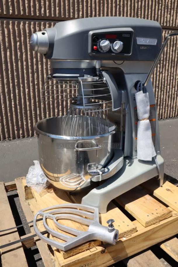 Hobart Legacy+ HL200 20 Qt. mixer with stainless steel bowl, beater, wire whip, dough hook. Plastic lid cracked, no timer damage.