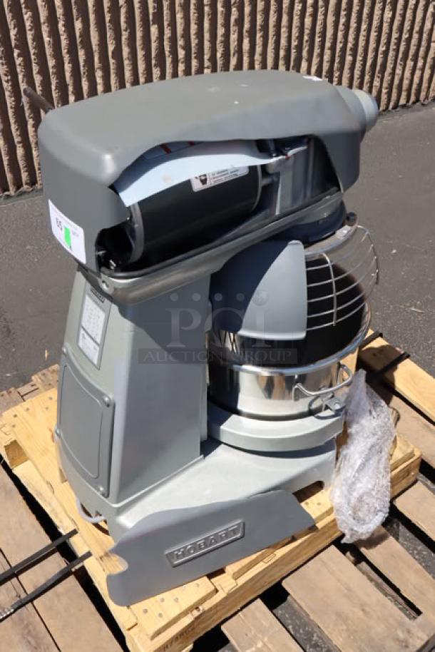 Hobart Legacy+ HL200 20 Qt. mixer with stainless steel bowl, beater, whip, dough hook, cracked plastic lid, #12 hub.