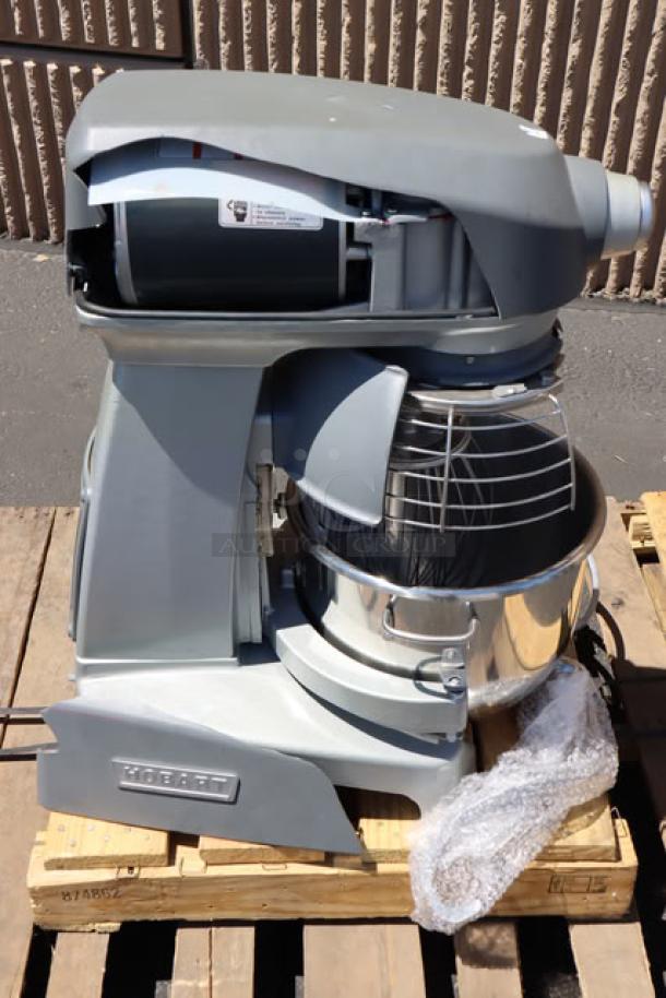 Hobart Legacy+ HL200 20 Qt. Planetary Stand Mixer, stainless steel bowl, beater, whip, dough hook, slight top lid crack.