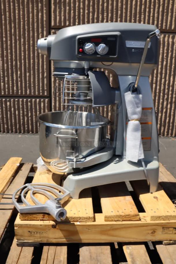 NEW Hobart Legacy+ HL200 20 Qt. Planetary Mixer with stainless bowl, beater, whip, dough hook; lid cracked, controls intact.