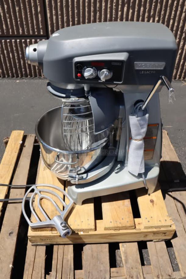 Hobart Legacy+ HL200 20 Qt. Stand Mixer with stainless bowl guard, bowl, beater, whip, dough hook. Cracked plastic lid.
