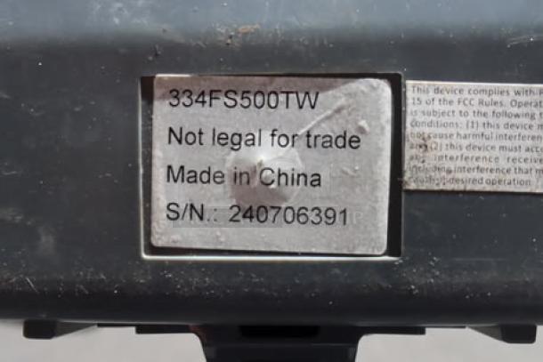 AvaTek FS500TW digital scale label showing model 334FS500TW, "Not legal for trade," and S/N: 240706391. Made in China.
