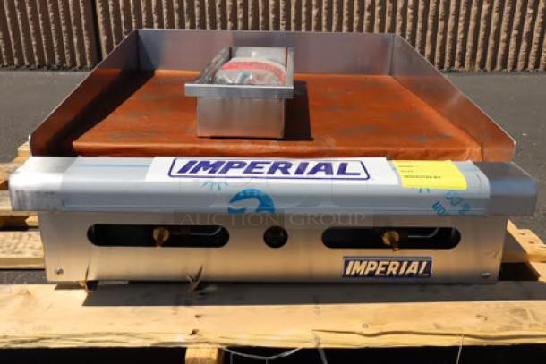 Brand new Imperial Range IMGA-2428-1 24" propane griddle, 60,000 BTU. Missing knobs, out of packaging.