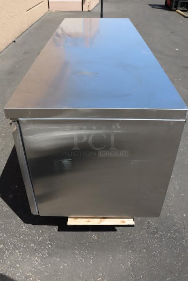 Avantco SS-UD-3R 93" stainless steel undercounter refrigerator, new condition, scratch, dent, bent caster visible.