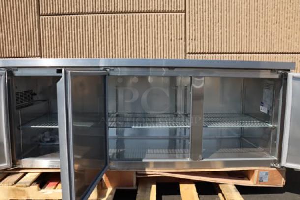 Avantco SS-UD-3R 93" stainless steel undercounter refrigerator, new, with dent on right corner, open doors showing shelves.