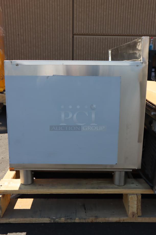 Regency 18"x36" stainless steel ice bin with galvanized legs, missing lid, small scratches, dents; 119 lb capacity.