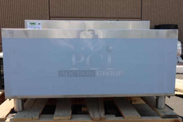 Regency 18" x 36" stainless steel ice bin, galvanized legs, missing lid, minor scratches, dents, 119 lb, NSF certified label visible.
