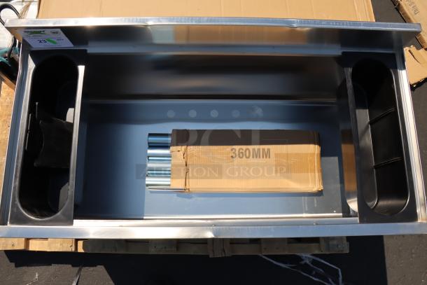 Regency 18"x36" stainless steel underbar ice bin, galvanized legs, bottle holders. Slight scratches, dents, missing sliding lid.