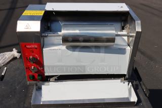 Avantco BT18A vertical contact conveyor bun toaster, 120V, 1600W. Scratched and dented, possibly missing parts. Serial number: 2920124184BT18A.