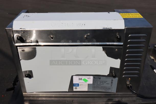 Avantco BT18A Vertical Contact Conveyor Bun Toaster, new, never used, 120V, 1600W, with scratches, dents, and possible missing parts.