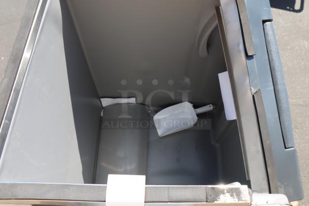 New Scotsman B530S Ice Storage Bin, 536 lb capacity, stainless steel. Unused, damaged ice bin door, includes scoop.