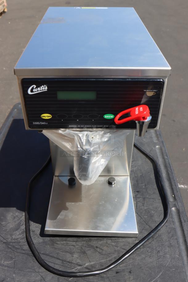 Curtis D60GT12A000 coffee brewer, new, never used, 120V, with bent base, serial no. 15128172, stainless steel finish.