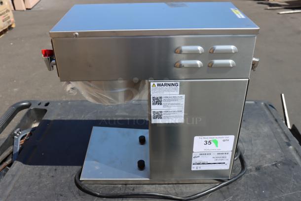 Curtis D60GT12A000 Low Profile Thermal Carafe Coffee Brewer, new, 120V, bottom bent upward, warning labels visible.