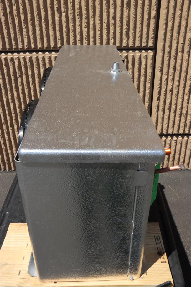 Brand new Master-Bilt 05-02595 Evaporator, Witt Sa28-134Ba 115, S/N: E032500148. Minor scratches and dents visible.