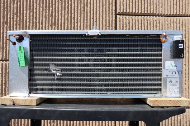 Brand new Master-Bilt 05-02595 evaporator, minor scratches and dents, model Witt Sa28-134Ba 115, S/N: E032500148.