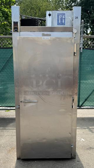 Traulsen ART 1-32 LUT 36" stainless steel roll-in refrigerator. Solid door, labeled "wine cooler," used condition.