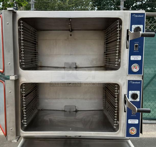 Cleveland 36PCGM300 ConvectionPro gas steamer with two compartments, stainless steel, clean interior, visible control dials.