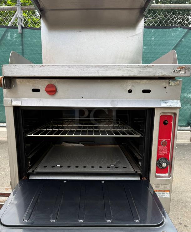 Vulcan "36 Standard Oven with 6 burners, 28000 BTU. Features open oven door, control panel, signs of wear on stainless steel.
