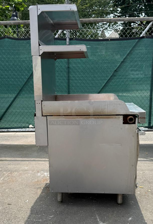 Vulcan 36" standard oven with 6 burners, 28000 BTU, stainless steel, dual shelves, side view, used condition.