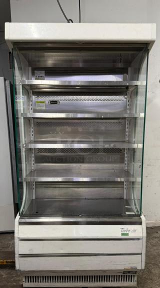 Turbo Air TOM-40W-N 39" white refrigerated air curtain merchandiser with multiple shelves, steel finish, and front glass panels.
