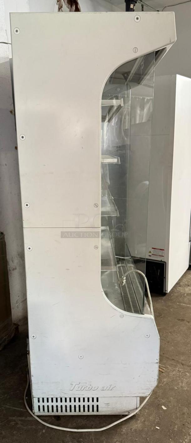 Turbo Air TOM-40W-N, 39" white refrigerated air curtain merchandiser. Good condition, visible logo on front panel.