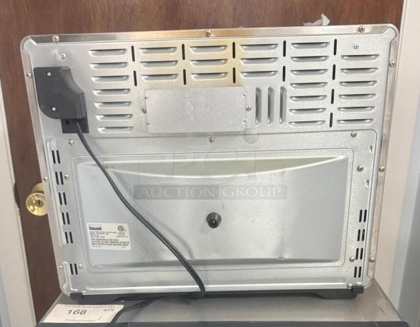 Bella Pro Series 12-in-1 Toaster Oven rear view, stainless steel, 33-qt. capacity, visible power cord, and label.