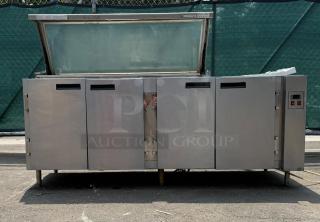 HEATCRAFT Refrigerator Unit RAMK23AG, stainless steel, 4-door, open top hatch, visible control panel, outdoor setting.