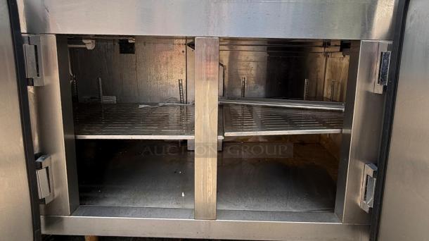 HEATCRAFT Refrigerator Unit RAMK23AG, visible interior shelves, stainless steel, commercial use, good condition.