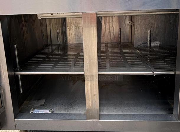 HEATCRAFT Refrigerator Unit Model RAMK23AG, stainless steel, dual shelf, visible wear, label with serial details.
