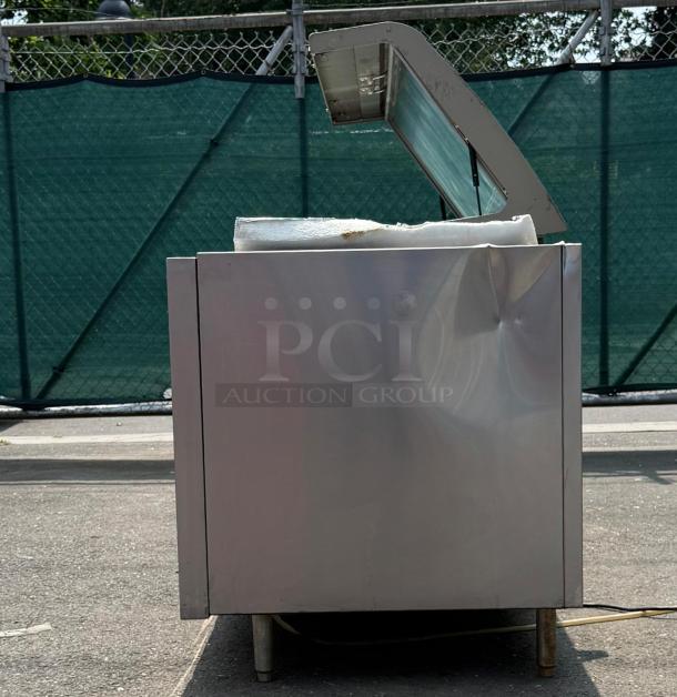 HEATCRAFT Refrigerator Unit, Model RAMK23AG, stainless steel, side view with open top, visible dents.
