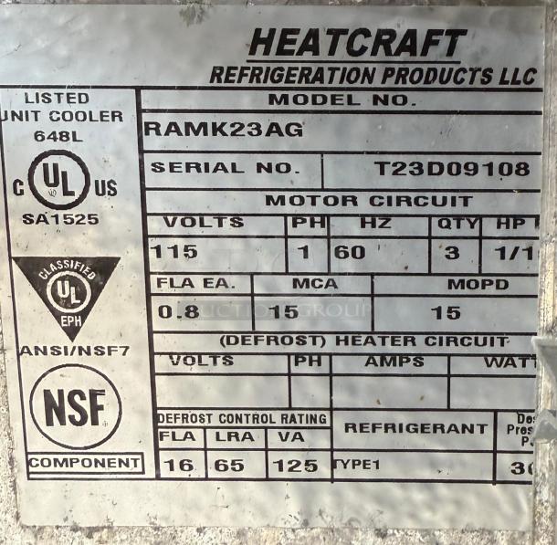Heatcraft Refrigerator Unit model RAMK23AG label showing specifications, serial number T23D09108, certifications, and defrost control rating.