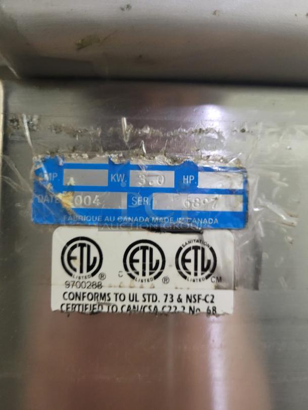 Berkel 450A vacuum packaging machine label showing model, serial number 6807, 3.0 KW, certification marks.