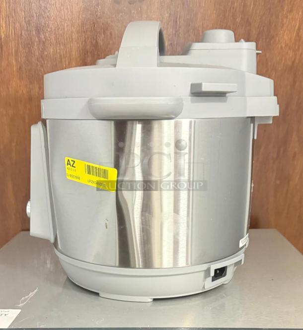 Instant Pot Pro Multi-Use Pressure Cooker, model LPZK0450032, in white and silver, with visible label and clean condition.