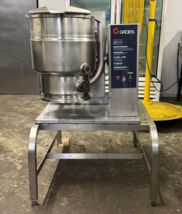 GROEN TDH/20 gas steam jacketed tilting kettle on stainless steel stand, used condition, visible control panel with labels.