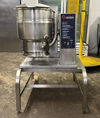 GROEN TDH/20 gas steam jacketed tilting kettle on stainless steel stand, used condition, visible control panel with labels.