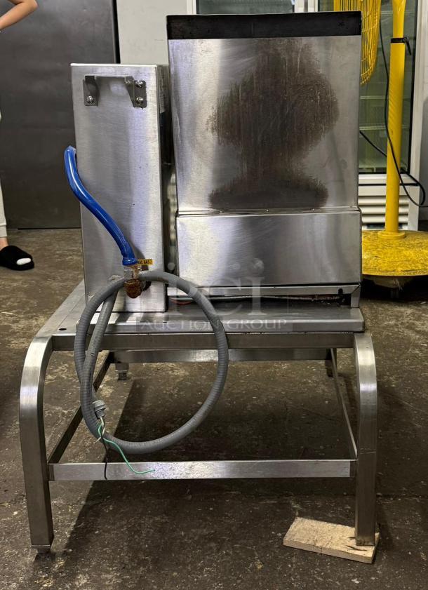 GROEN TDH/20 gas steam jacketed tilting kettle on stand. Stainless steel, visible scratches, attached hose, used condition.