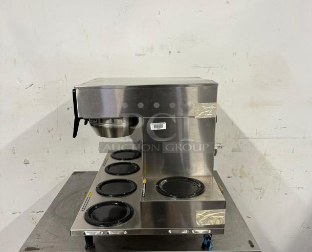 Bunn 38700.0015 Axiom 0/6 Twin 12 Cup Coffee Brewer, 6 lower warmers, stainless steel, model AXIOM 0/6 TWIN, used condition.