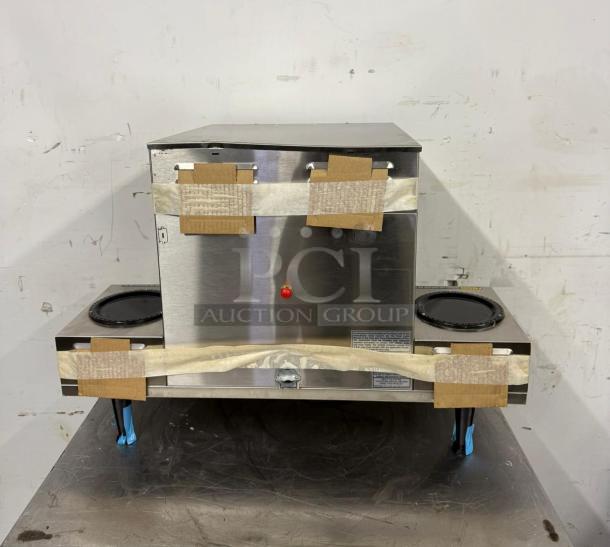Bunn AXIOM 0/6 Twin 12 Cup Automatic Coffee Brewer, six lower warmers, stainless steel, model 38700.0015, auction item.