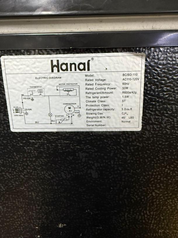 WANAI Deep Small Chest Freezer 3.0 Cu.Ft BC/BD-110, black. Features diagram sticker. Rated voltage: AC110-120V.